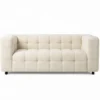 Canapé double capitonné en tissu bouclette beige