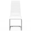 Chaises blanches de salle à manger