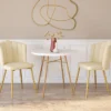 Chaises coquillages beiges en velours et pieds dorés