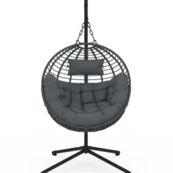 Fauteuil rond suspendu ajouré effet rotin gris avec coussin gris