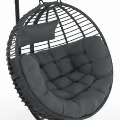 Fauteuil rond suspendu ajouré effet rotin gris avec coussin gris