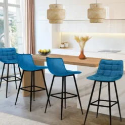 Lot de 4 tabourets en velours bleu canard matelassé
