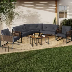 Salon de jardin bas 8 places canapé d'angle, fauteuils avec coussin gris et 2 tables basses